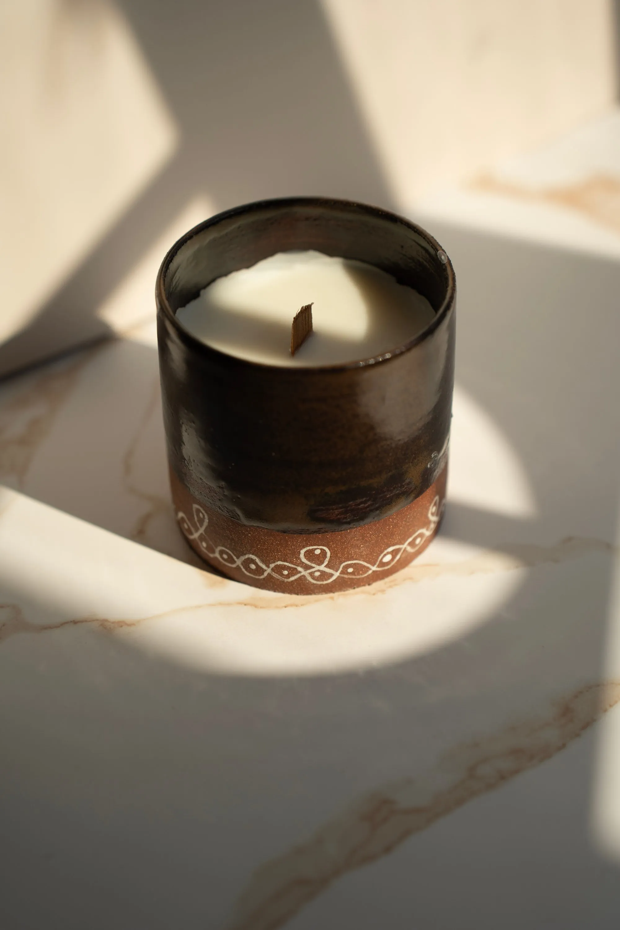 Kolam print candle